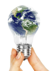 One lamp in human hand on white background. Elements of this image furnished by NASA
